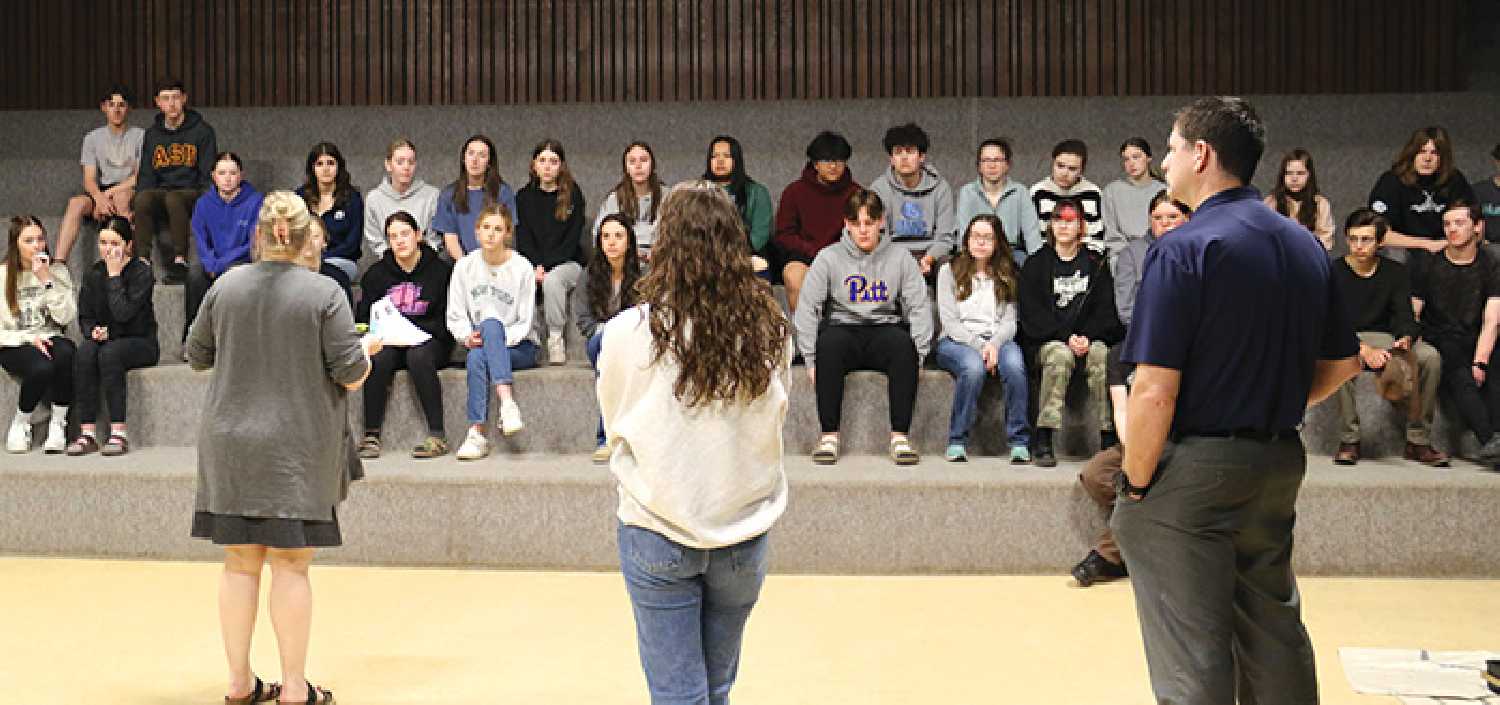 McNaughton School Principal Sherrie Meredith, Youth Councillor Molly Martens, and Councillor Murray Gray speak to McNaughton Grade 10 students about the search for a new youth councillor for Moosomin town council.
